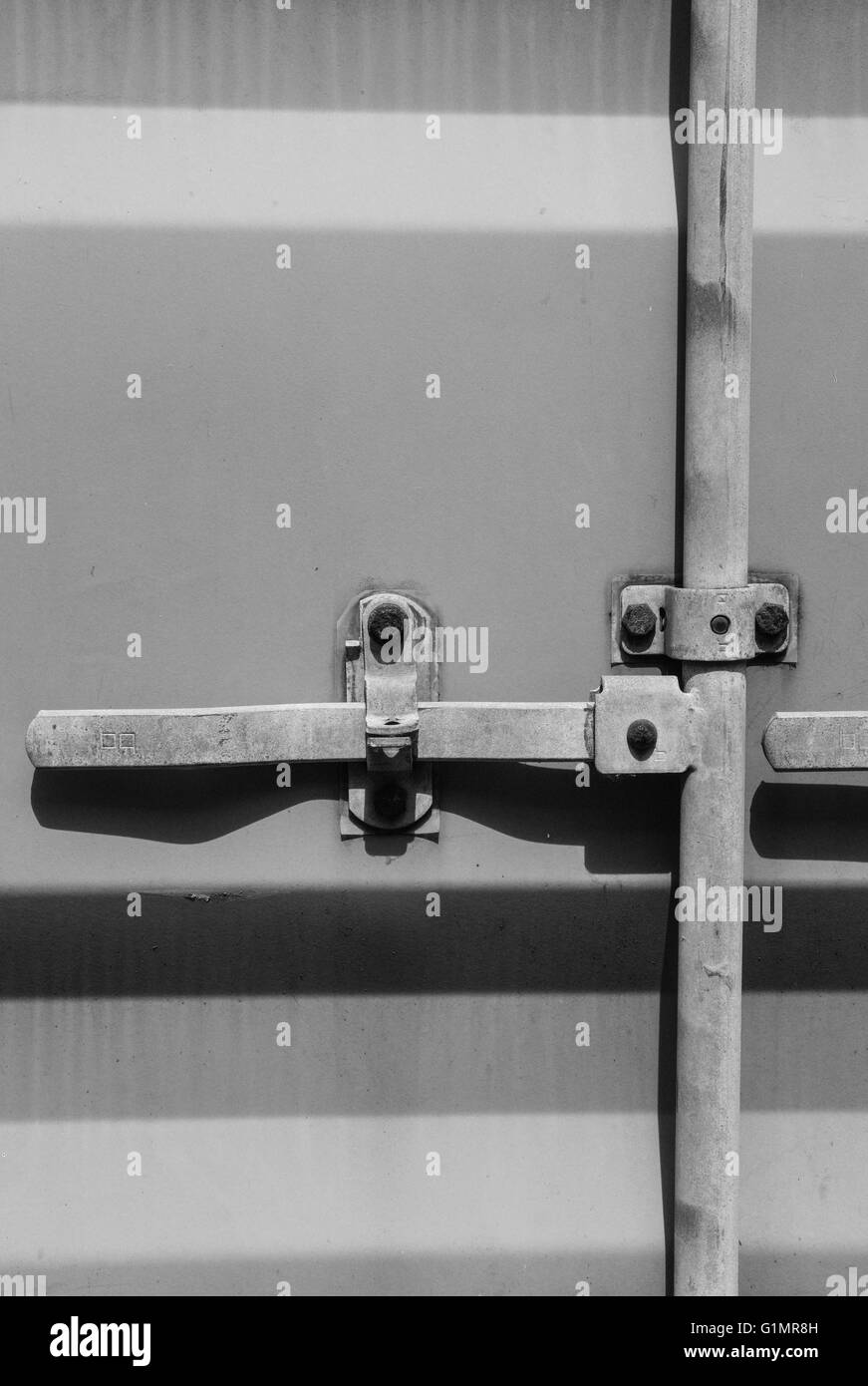 Detail of a typical shipping container locking system, showing the