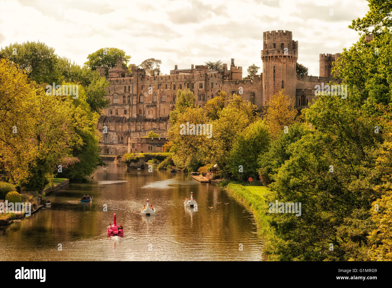 Medieval British castles and buildings; view of the 12th century Warwick Castle and the River Avon, Warwick, Warwickshire, England UK Stock Photo