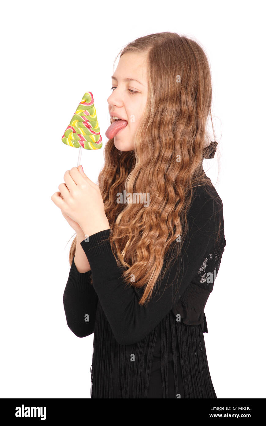 Young girl with one lollipop. Isolated on white Stock Photo - Alamy
