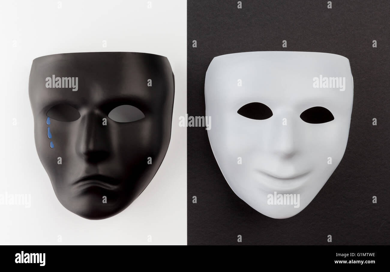 Theatrical masks expressing happy and sad emotions. Depression emotional concept. Stock Photo