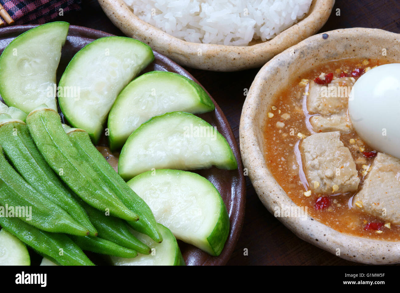 Meal for vegetarian with menu bottle gourd, okra, egg, cooked rice, soya cheese. This
