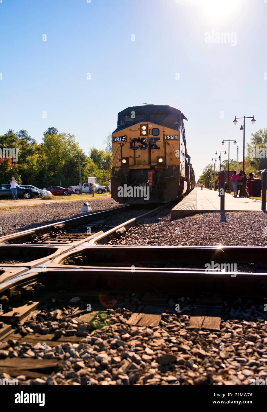 desiel train, locomotive, deaiel locomotive,CSX train traveling through the cross roads in Hamlet North Carolina Stock Photo