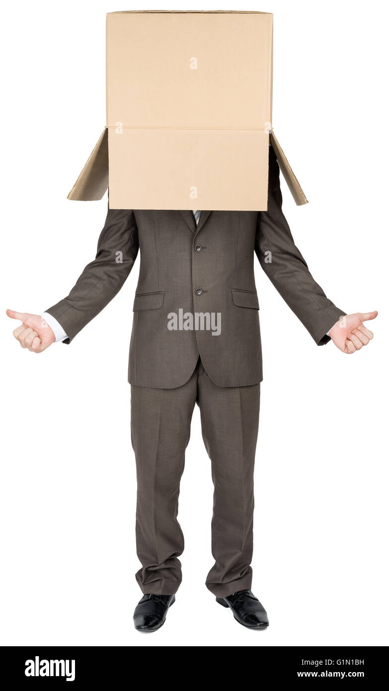 Businessman gesturing with cardboard box on head Stock Photo