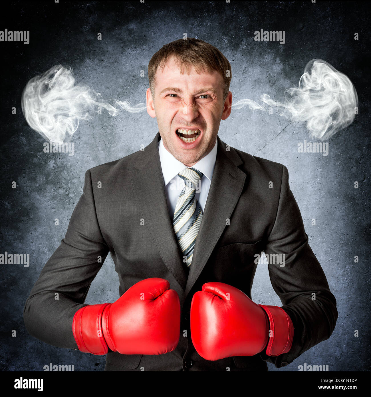 Business man to rage and smoke in head Stock Photo - Alamy