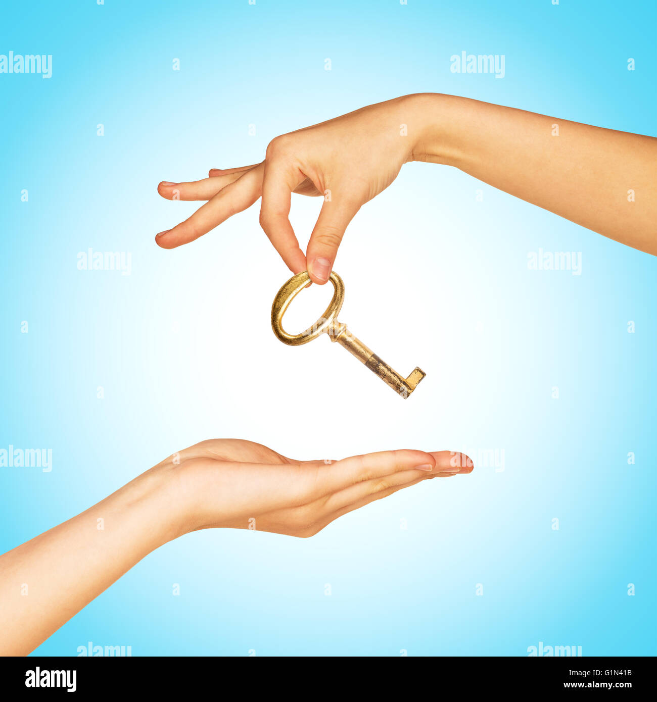 Hand giving key Stock Photo Alamy