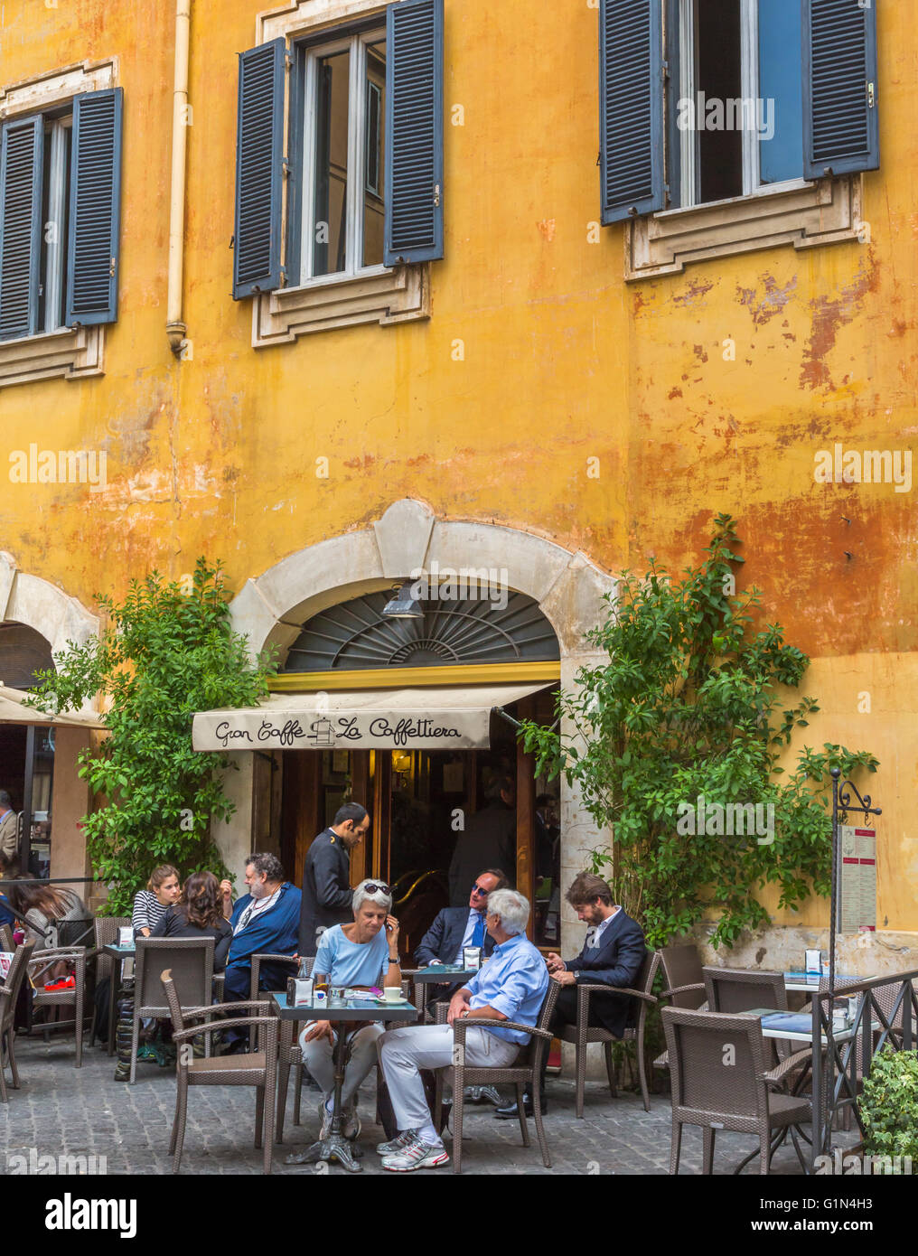 Rome, Italy.  Pavement cafe life in Piazza di Pietra. Stock Photo