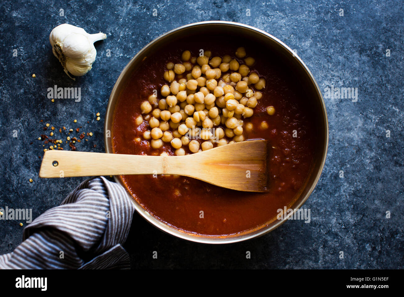 chickpeas cooking in a pan Stock Photo