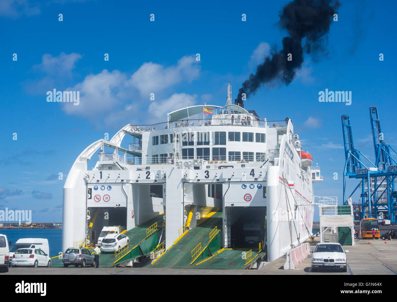 Black smoke from Naviera Armas ferry funnel in Las Palmas port. Gran Canaria, Canary Islands, Spain Stock Photo