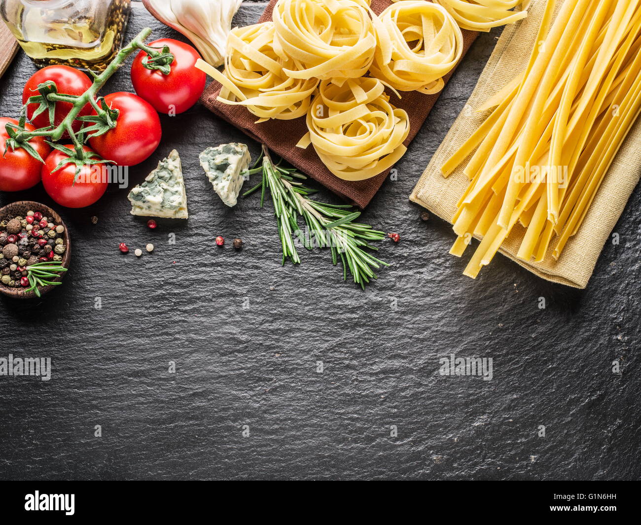 Pasta ingredients. Cherrytomatoes, spaghetti pasta, rosemary and