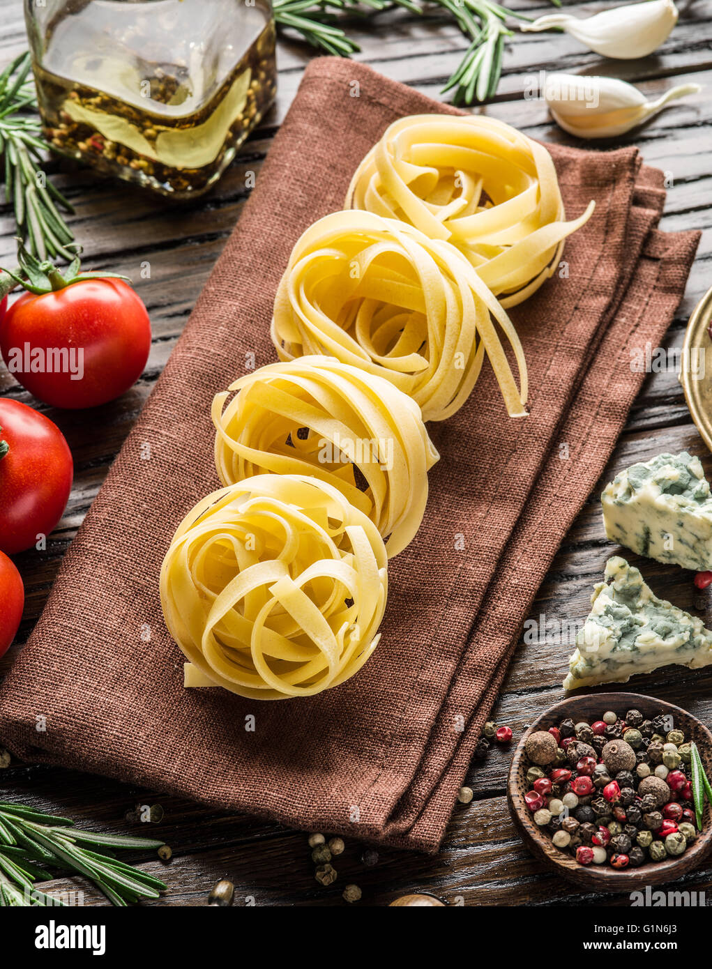 Pasta ingredients. Cherrytomatoes, spaghetti pasta, rosemary and