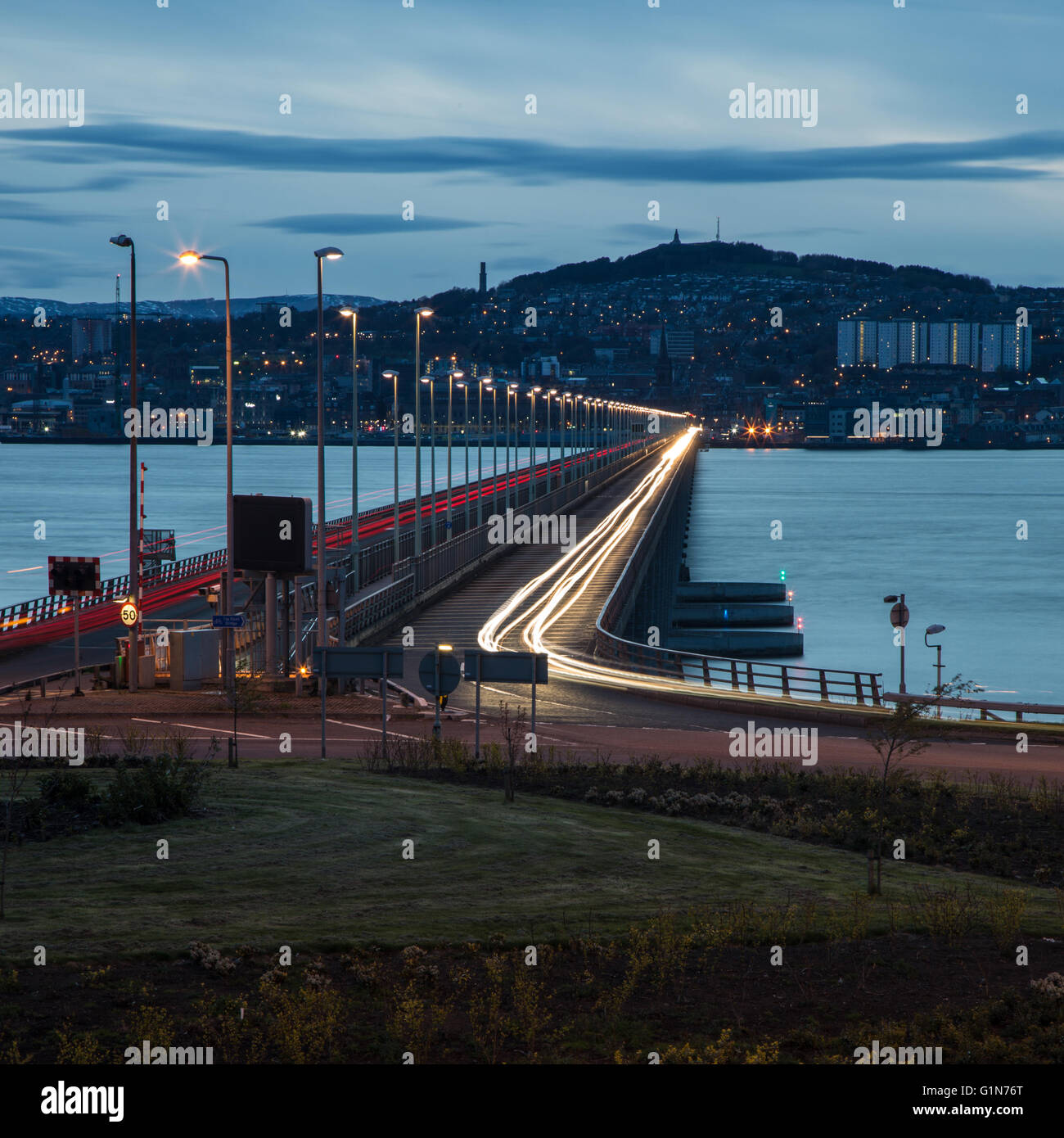 Looking over the Tay Road Bridge from Fife towards Dundee at dusk Stock