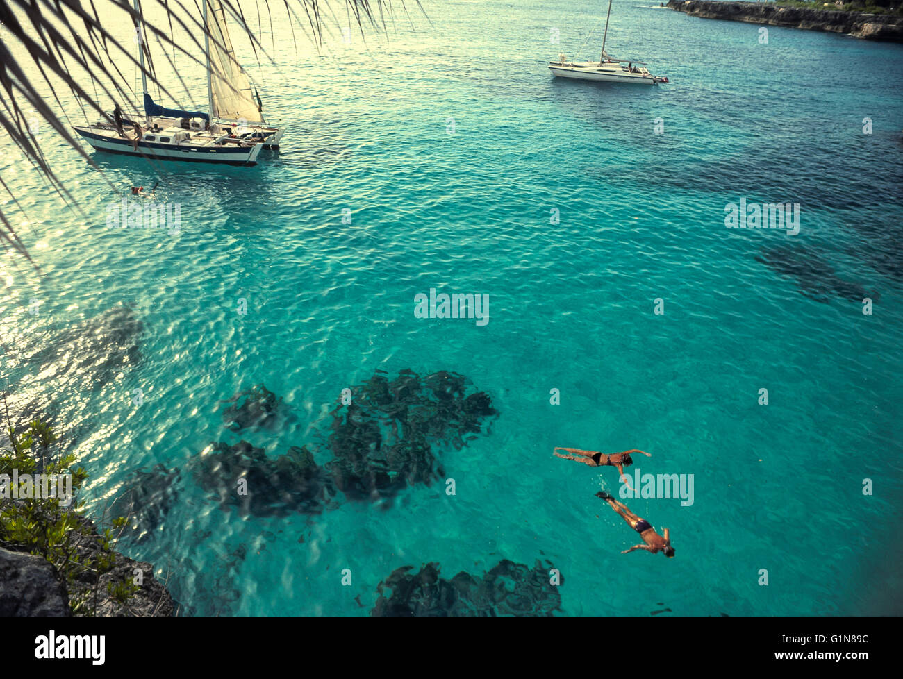 Couple snorkeling off the cliffs of Negril, Jamaica Stock Photo