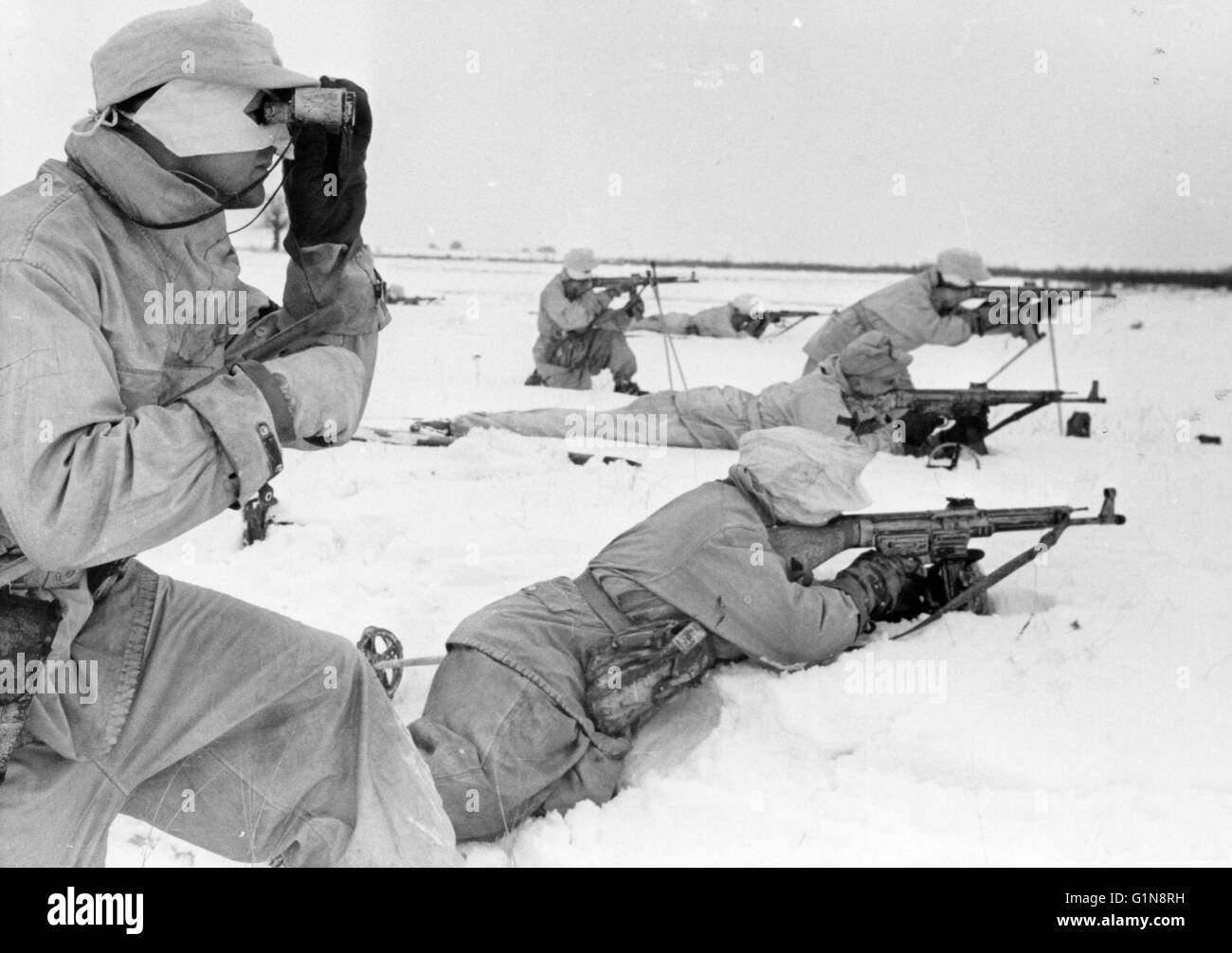 German Ski Troops with MP44 Assault Rifles in action Eastern Front 1944 Stock Photo