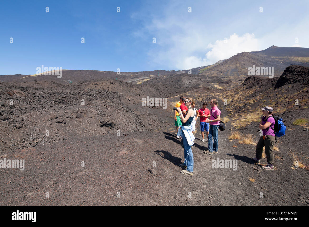 Group of tourists on Mount Etna Stock Photo