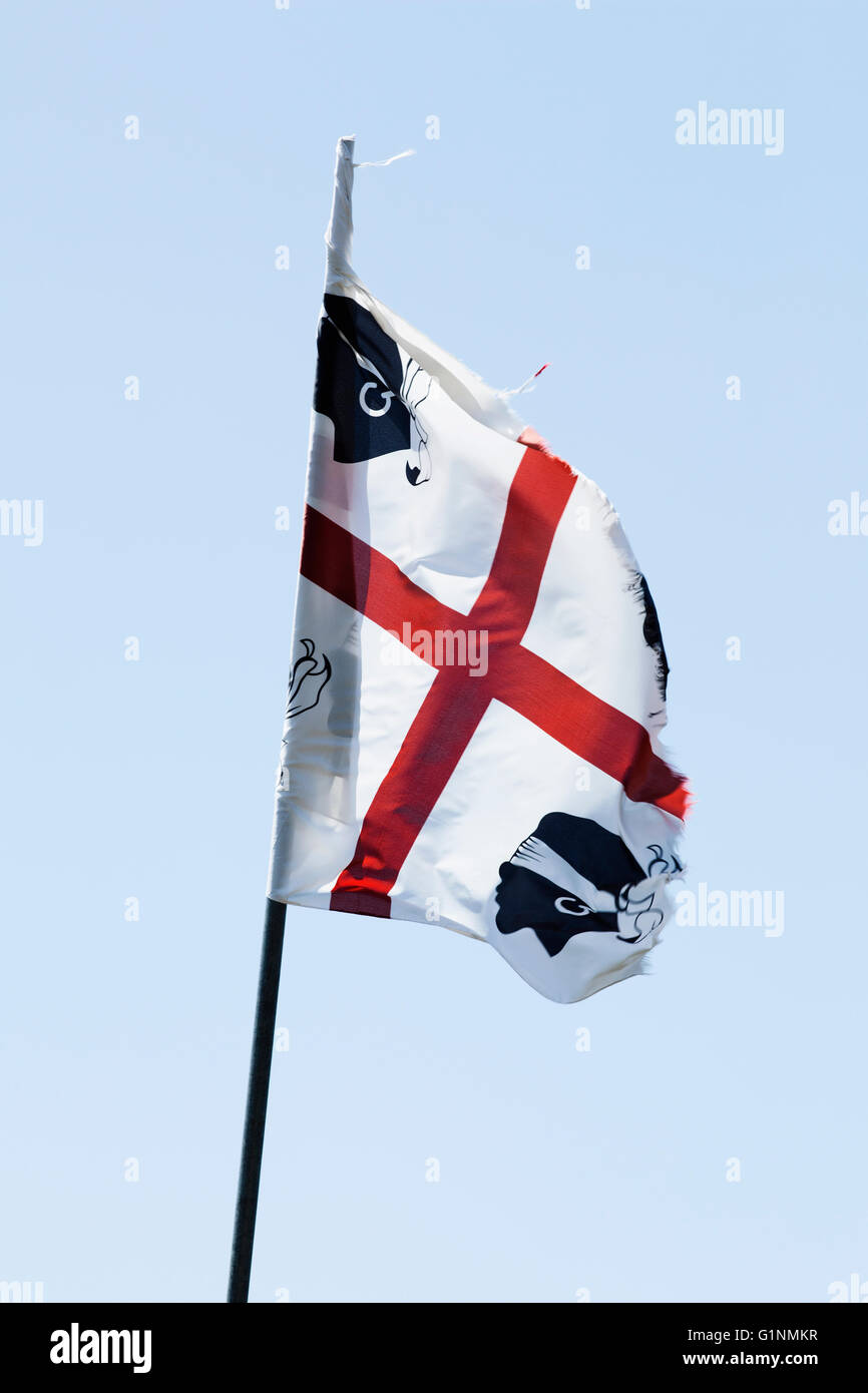 Sardinian flag against a blue sky Stock Photo