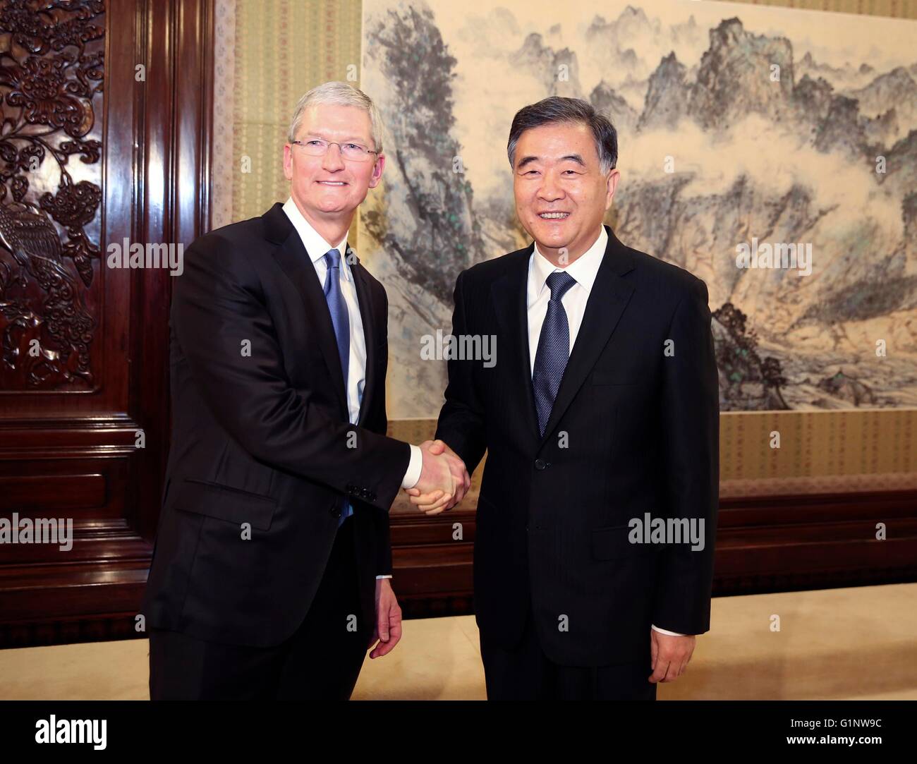 Beijing, China. 17th May, 2016. Chinese Vice Premier Wang Yang (R) meets with Apple Chief Executive Officer Tim Cook in Beijing, capital of China, May 17, 2016. Credit:  Ding Lin/Xinhua/Alamy Live News Stock Photo