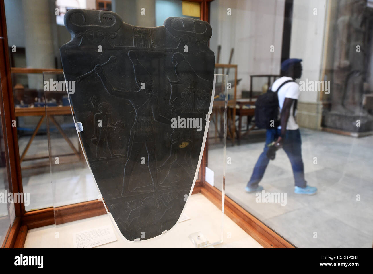 (160518) -- CAIRO, May 18, 2016 (Xinhua) -- A visitor walks past the Narmer Palette at the Egyptian National Museum in Cairo May 17, 2016, one day before the International Museum Day. (Xinhua/Zhao Dingzhe) (zhf) Stock Photo