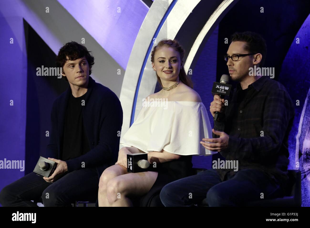 Beijing, China. 18th May, 2016. Director Bryan Singer (R), actor Evan Peters (L) and actress Sophie Turner attend a press conference for the film 'X-Men: Apocalypse' in Beijing, capital of China, May 18, 2016. The release date of the film in the Chinese mainland is sheduled on June 3. Credit:  Xinhua/Alamy Live News Stock Photo