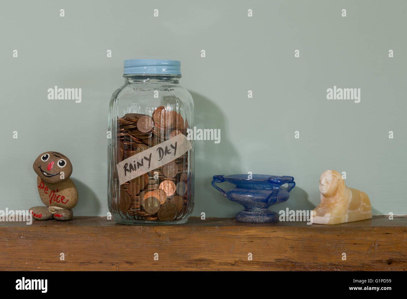 A glass jar used to save money Stock Photo Alamy