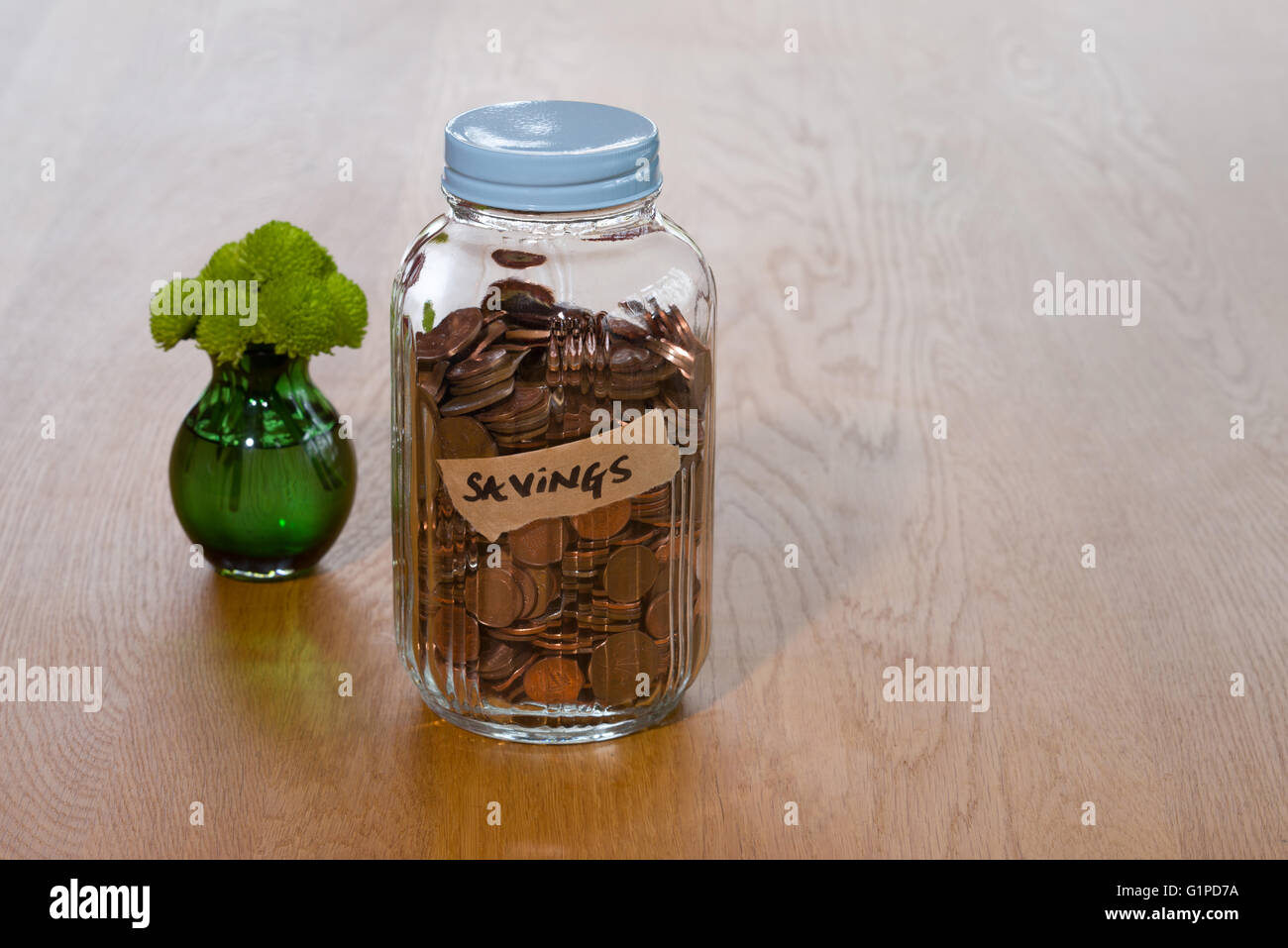 A glass jar used to save money Stock Photo Alamy