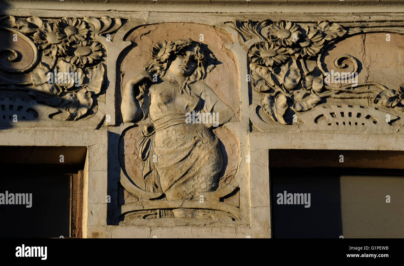 Art Nouveau. Russia. Relief in a Suvorovsky street building. Woman. Saint Petersburg. Stock Photo