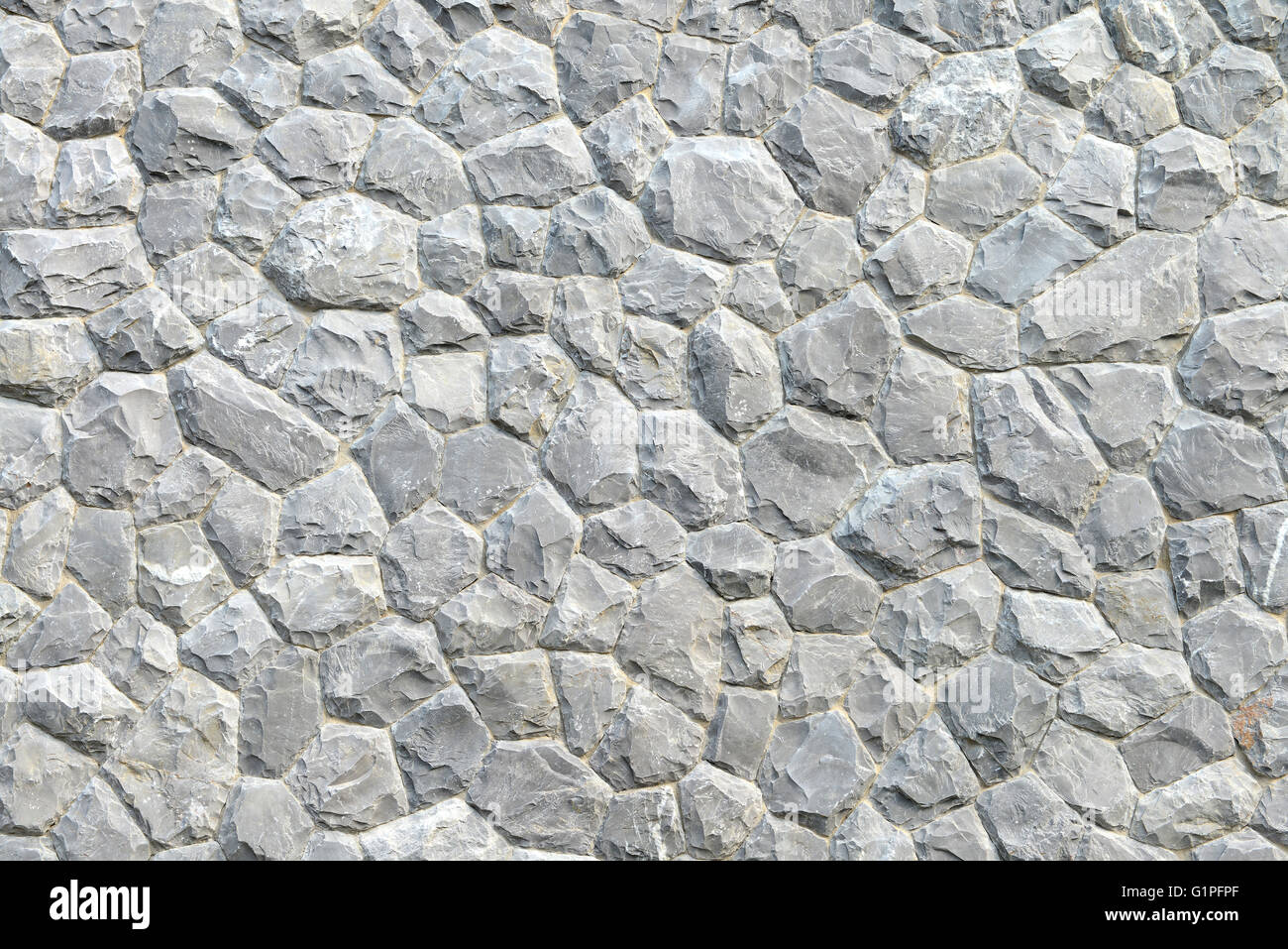 Gray stone wall texture and background Stock Photo - Alamy