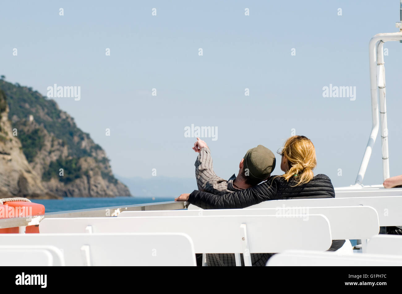 tourists on boat trip peninsula of Portofino italy Stock Photo