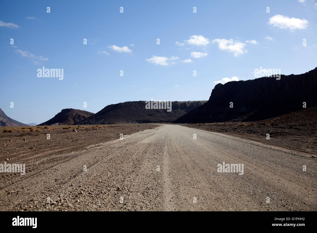Aussenkehr Gravel Dusty Road Towards Ais Ais and Fish River Canyon in Namibia Stock Photo