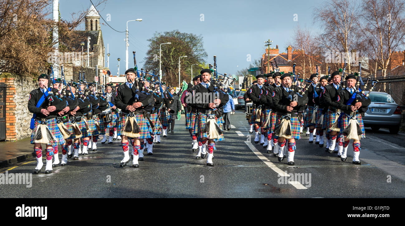 Irish American pipe band marching through Arbour Hill in Dublin for the