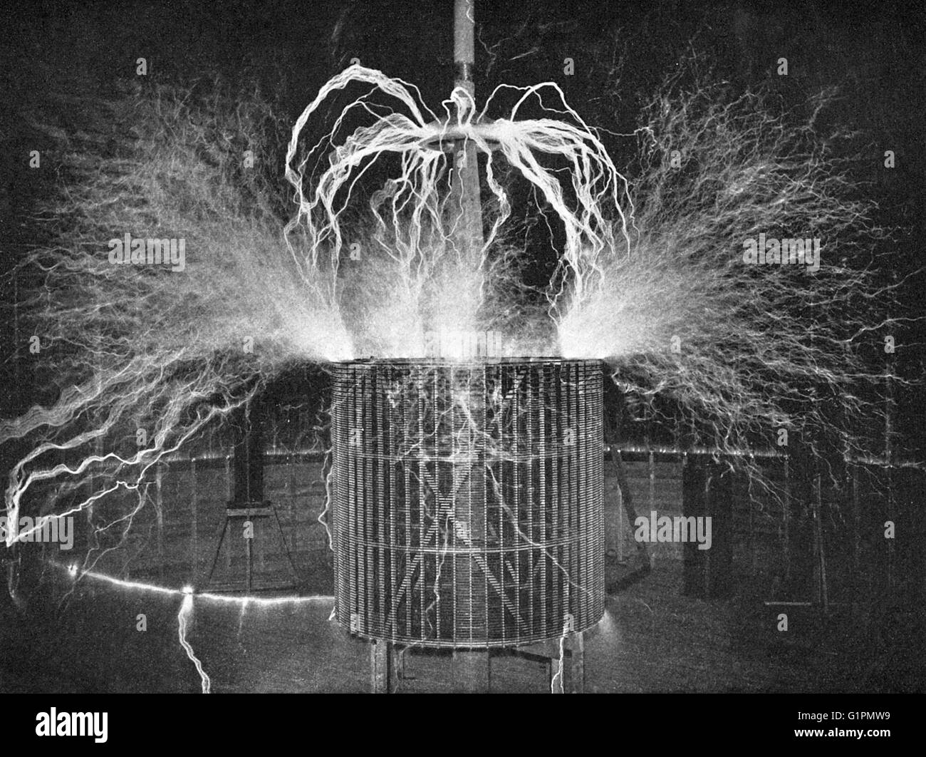 TESLA'S LABORATORY, c1900.  Burning the nitrogen of the atmosphere in experiment in Nikola Tesla's laboratory in Colorado Springs, Colorado. Photograph by Dickenson V. Alley, c1900. Stock Photo