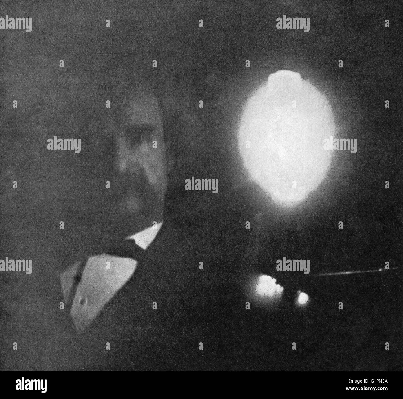 MARK TWAIN (1835-1910). Samuel Clemens. American writer and humorist. Photographed by phosphorescent light in Nikola Tesla's laboratory; the exposure time was ten minutes. Photograph, January 1894. Stock Photo