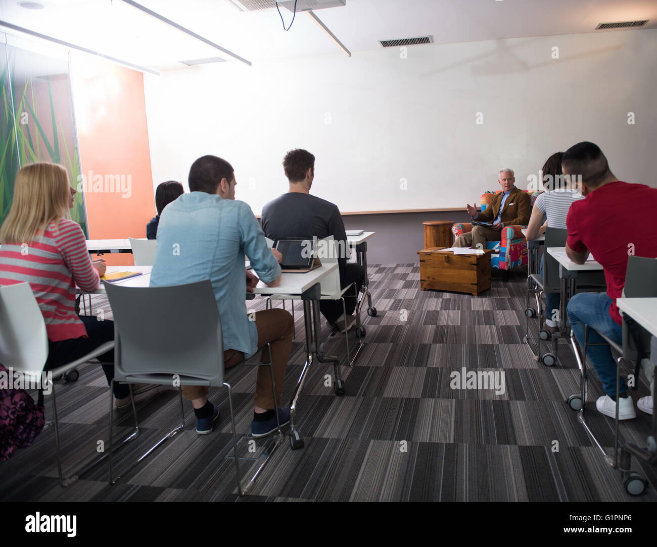 group of students study with professor in modern school classroom Stock ...