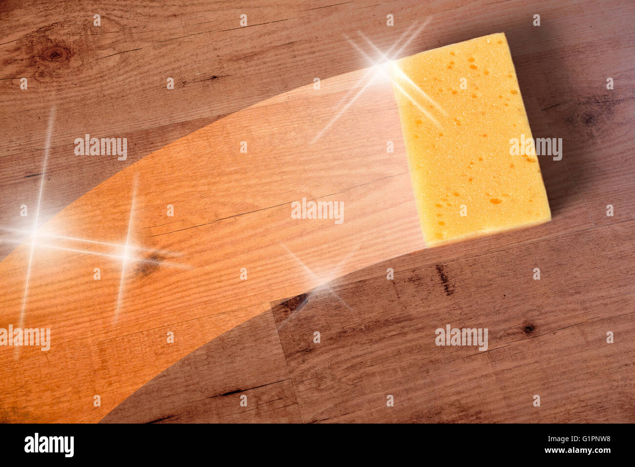 Cleaning wooden parquet concept with trace yellow sponge. Horizontal composition. Stock Photo