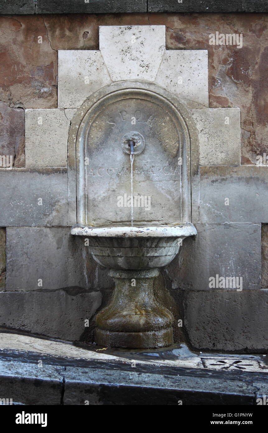 Ancient drinking fountain in the downtown of Rome, Italy Stock Photo Alamy