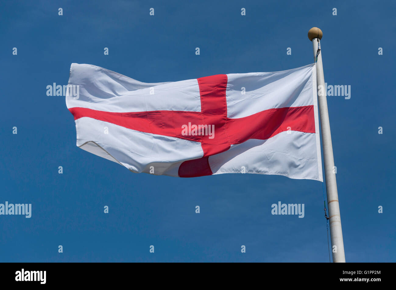 Flag of England on village green, Datchet, Berkshire, England, United Kingdom Stock Photo