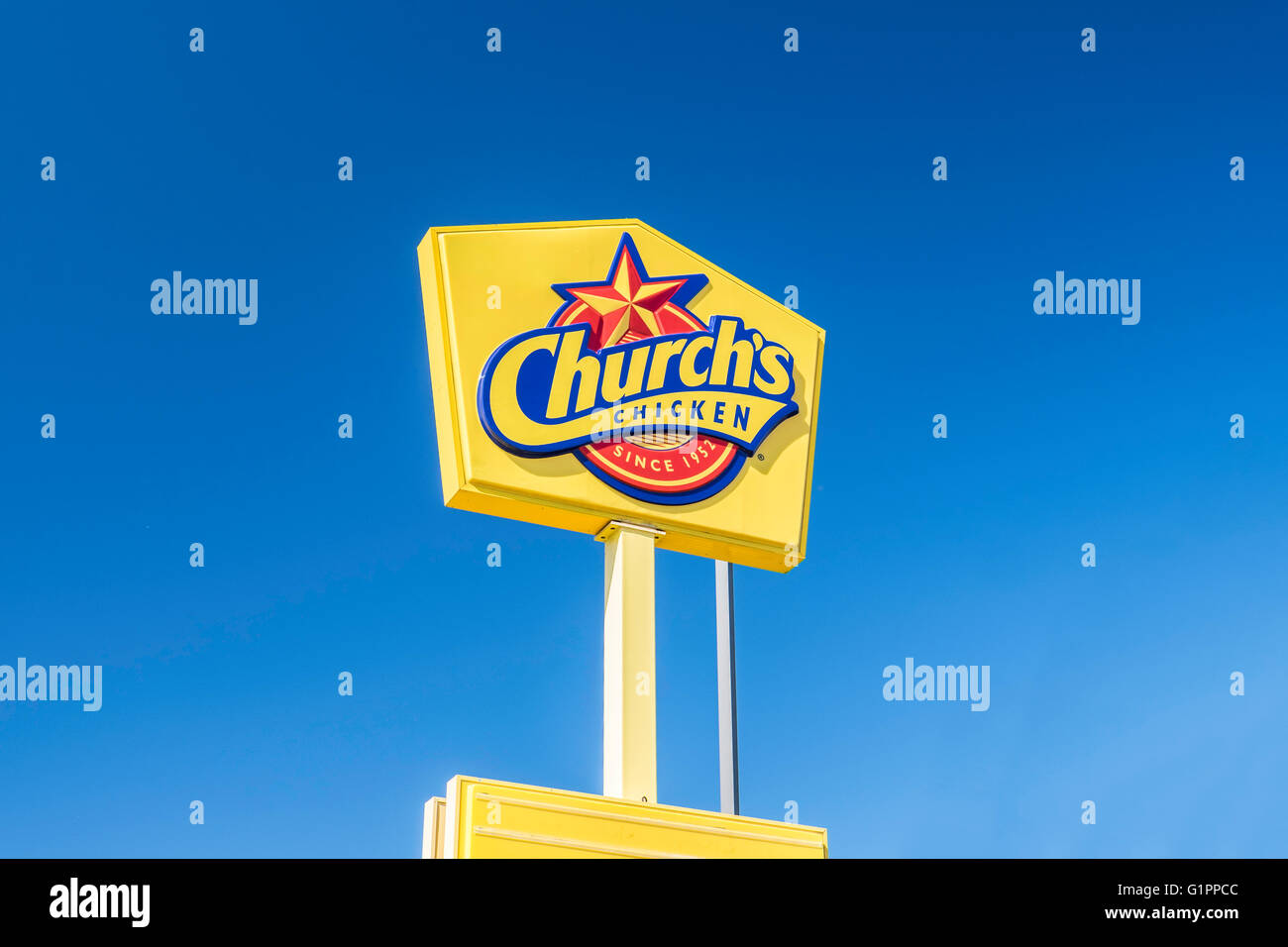 A pole sign advertising Church's Chicken, a fast food eatery in Oklahoma City, Oklahoma, USA. Stock Photo