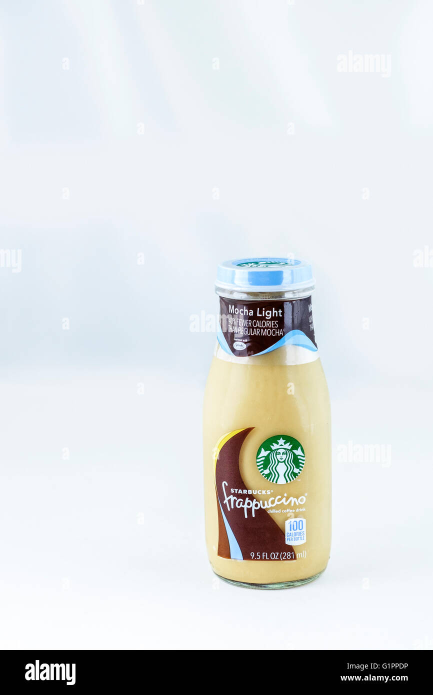 A bottle of Starbucks cold serve Frappuccino coffee drink. Cutout, isolated on white. Stock Photo