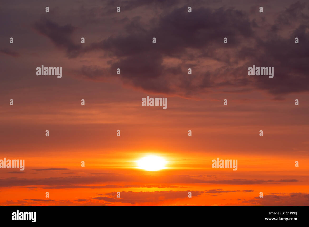Fiery orange sunset sky. Beautiful sky background Stock Photo - Alamy