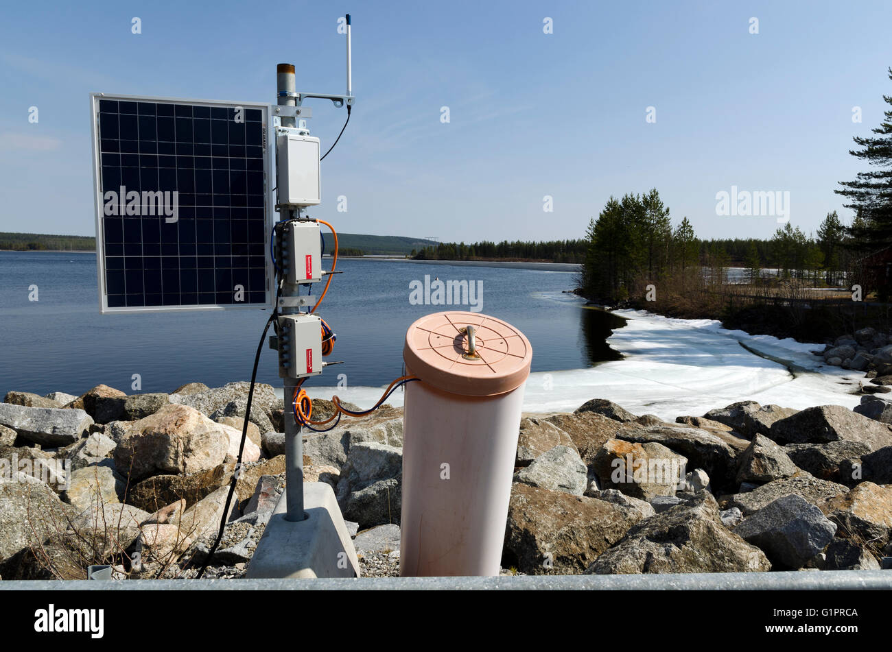 Remote surveillance of movements in a power plant embanking with power from the sun, picture from the North of Sweden. Stock Photo