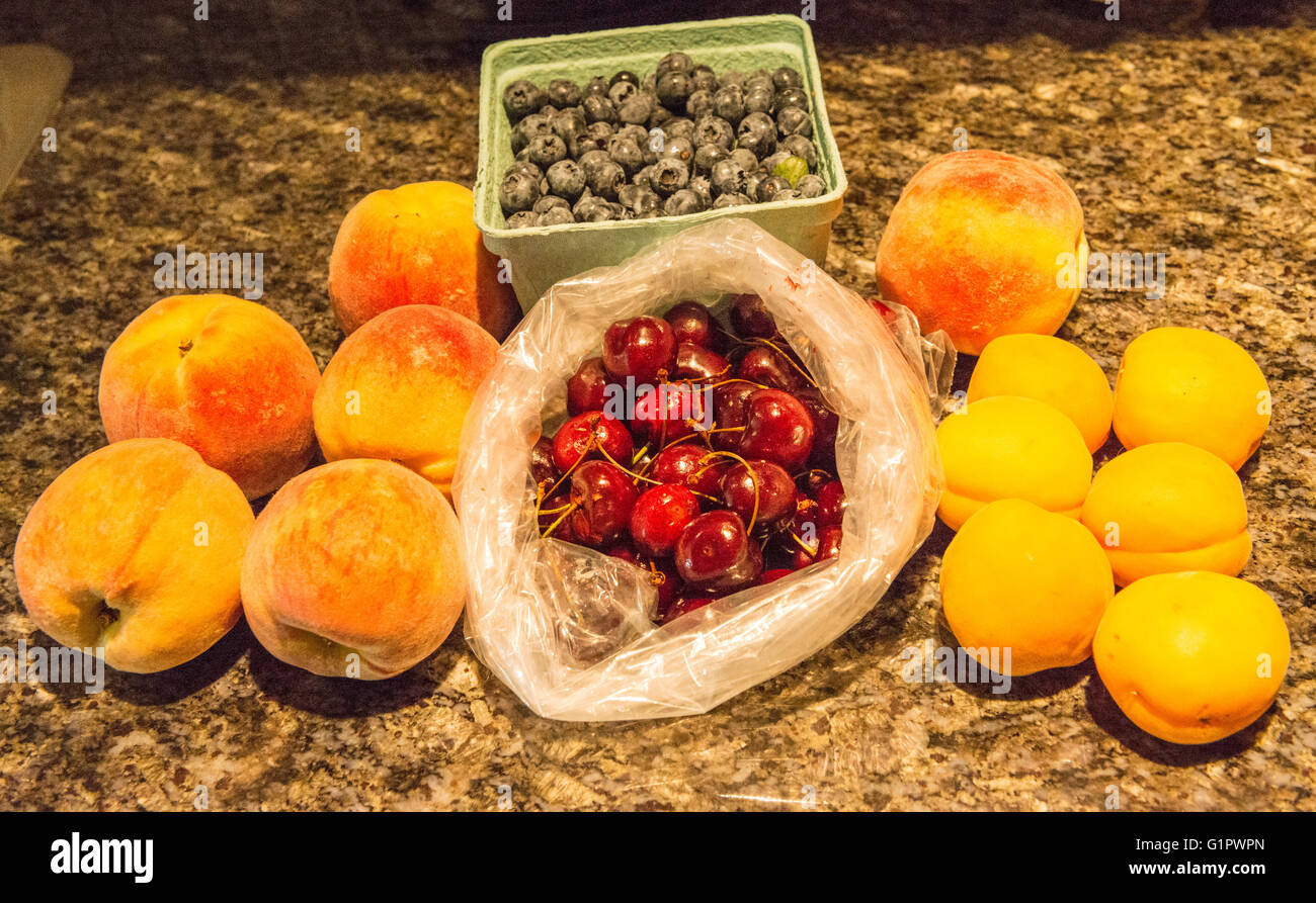 Selection of fresh Okanagan fruits purchased at roadside fruit stands near Summerland, BC
