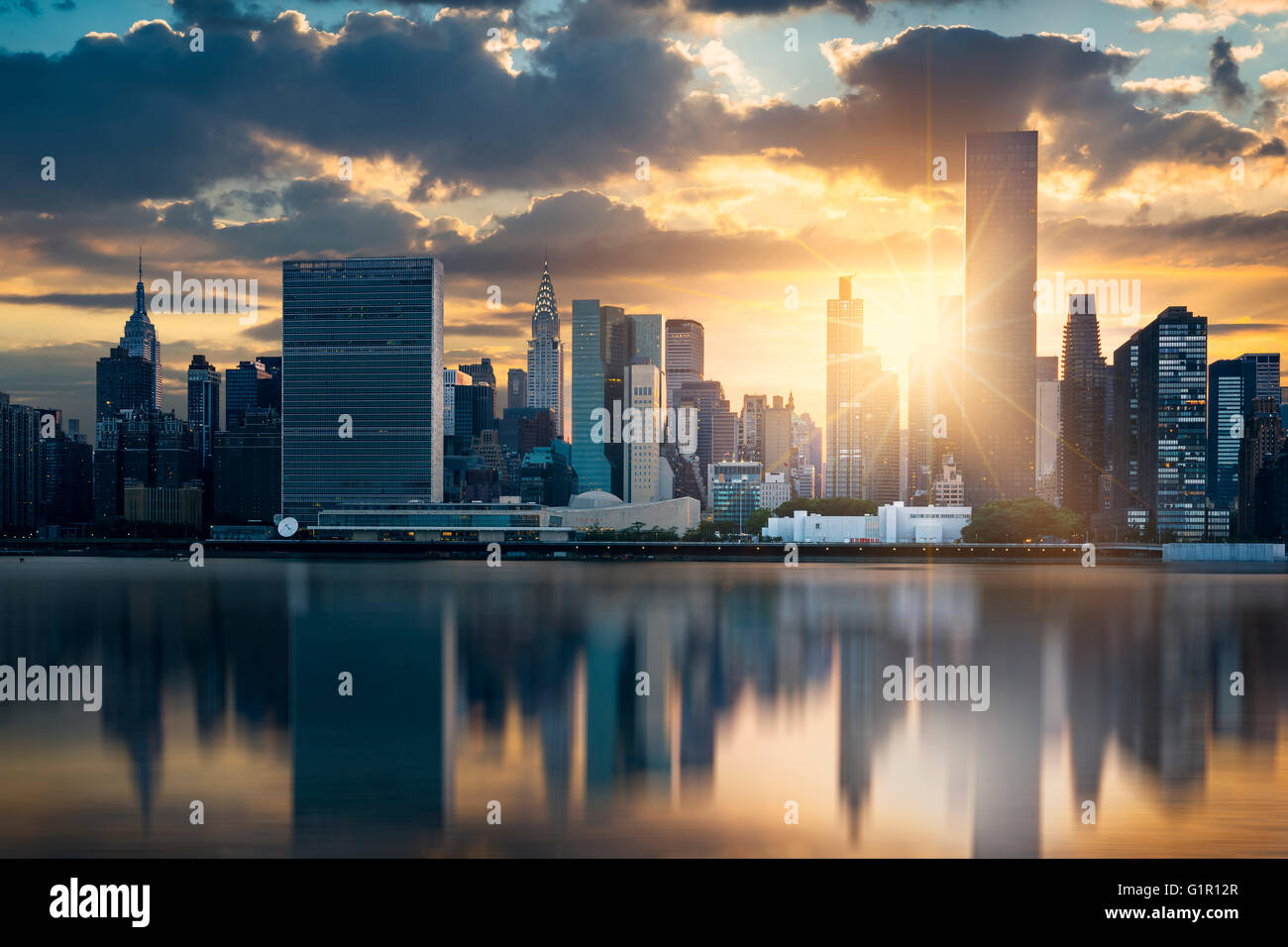 New York City skyline with urban skyscrapers at sunset, USA Stock Photo ...