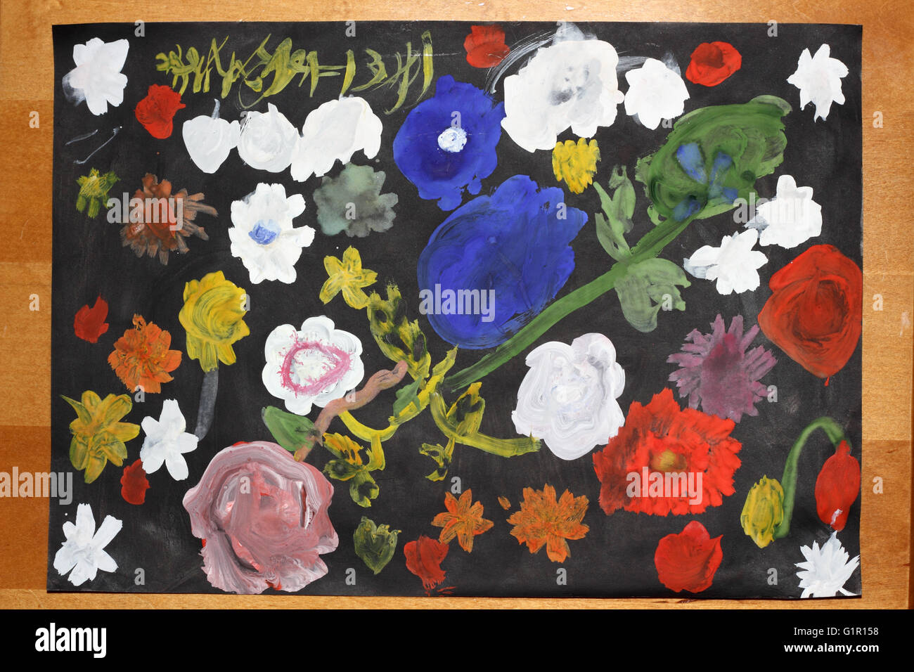Child picture (flowers on the black sheet Stock Photo Alamy