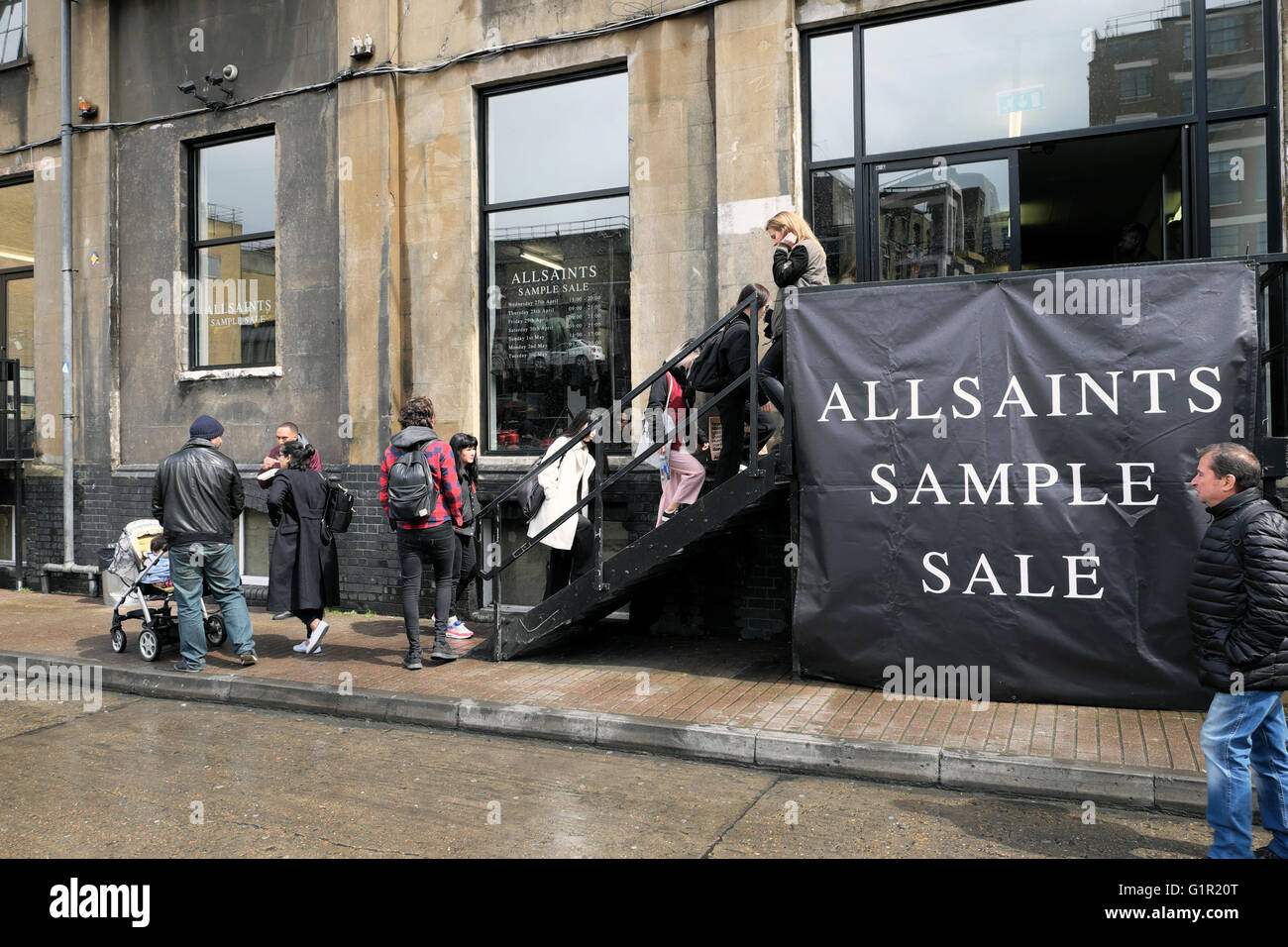 People shopping at ALLSAINTS sample sale in Shoreditch warehouse London UK  KATHY DEWITT Stock Photo - Alamy
