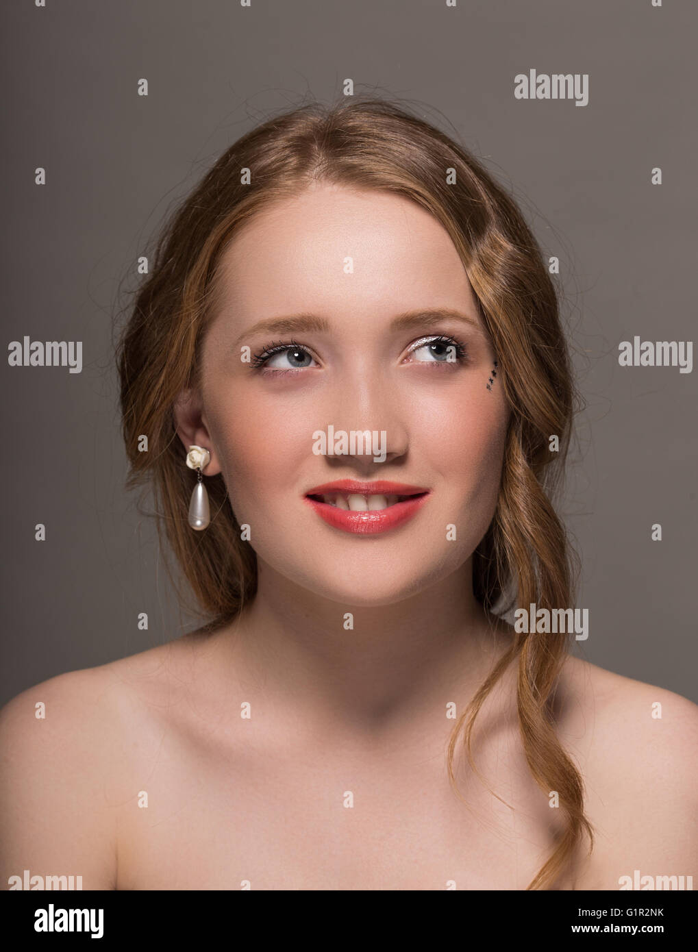 Portrait of a young woman in studio Stock Photo - Alamy