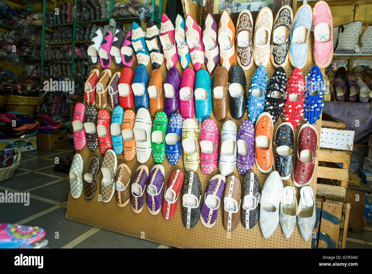 Shoe shop full of leather color shoes at market Tangier, Morocco Stock