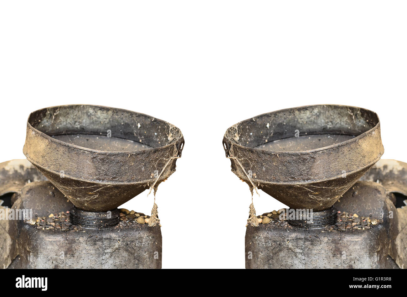 Two Old Oil funnel on white background Stock Photo Alamy