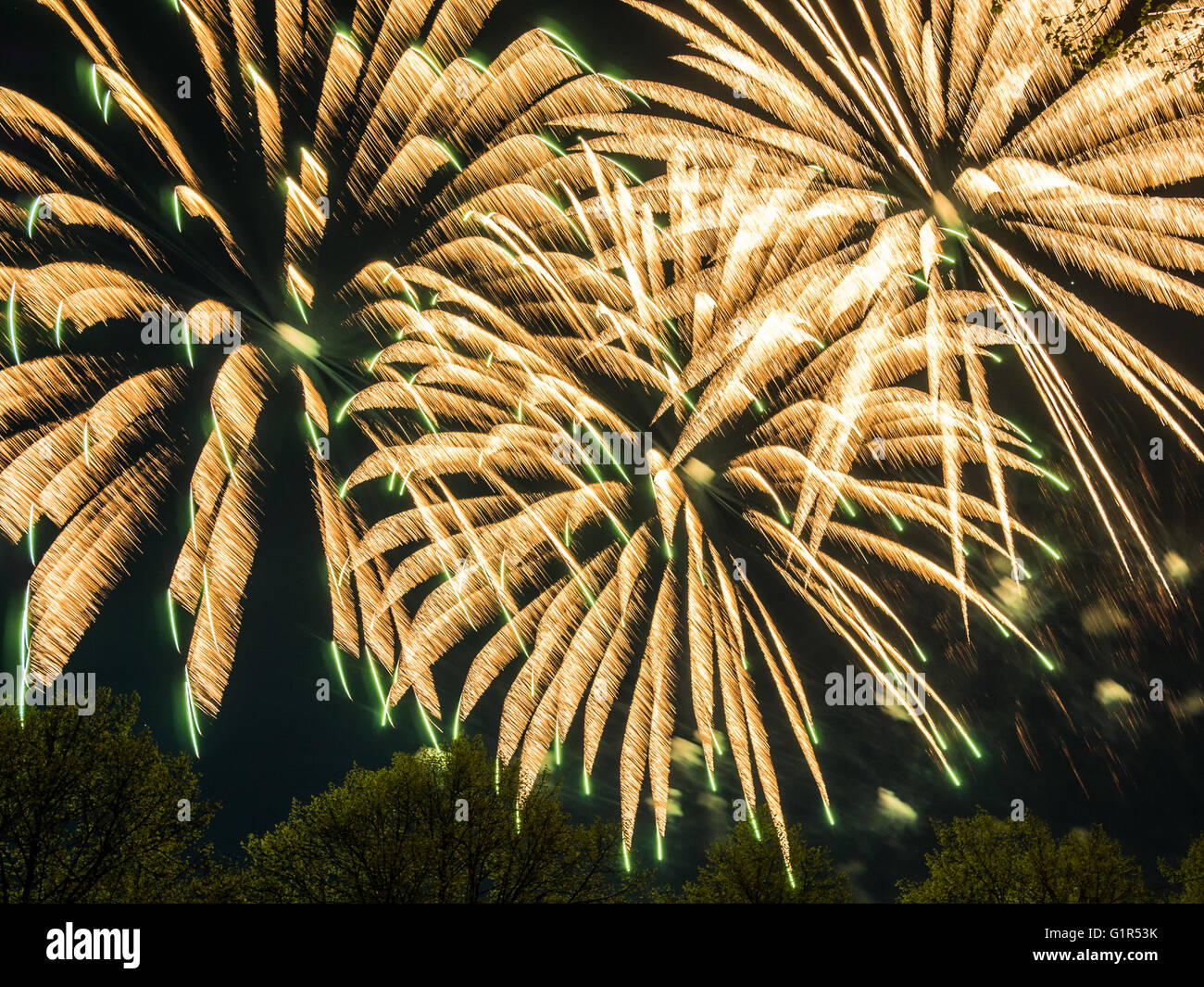 Big colorful fireworks at night, celebration fest Stock Photo