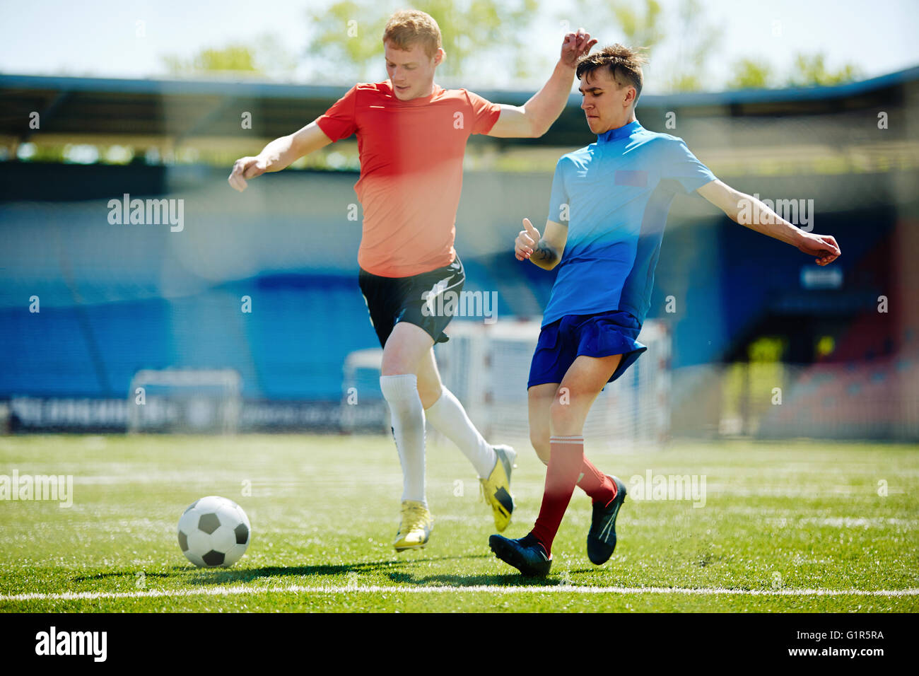 Competition between footballers Stock Photo
