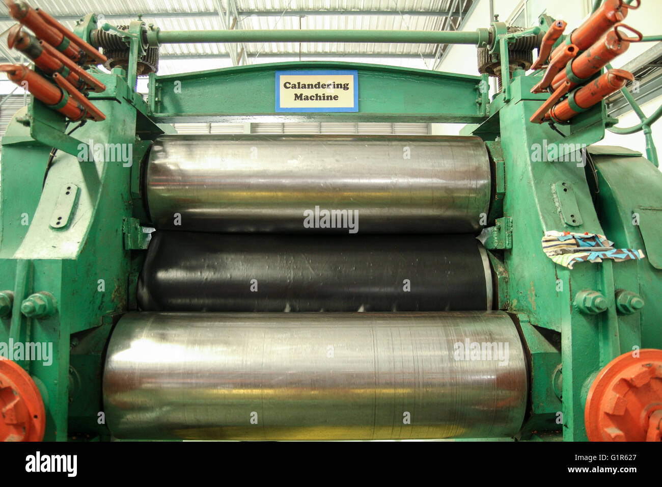 Rubber rolling machine hi-res stock photography and images - Alamy