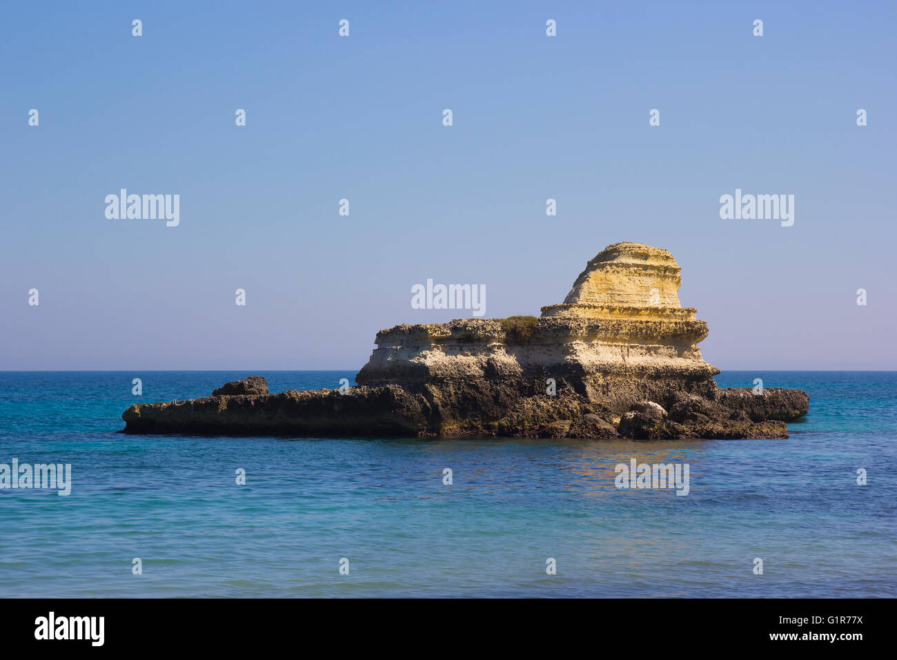 Rocky stacks of Santo Andrea on the sea of Salento in Puglia in Italy Stock Photo